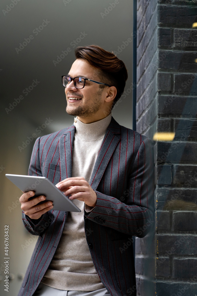 Portrait of successful business man, entrepreneur working in urban background Portrait of successful business man, entrepreneur working in urban background