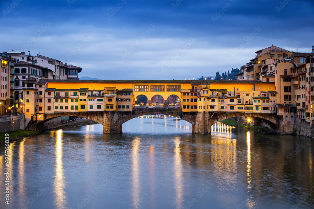 River Arno and famous bridge Ponte Vecchio at sunset from Ponte alle Grazie in Florence, Tuscany, Italy River Arno and famous bridge Ponte Vecchio at sunset from Ponte alle Grazie in Florence, Tuscany, Italy