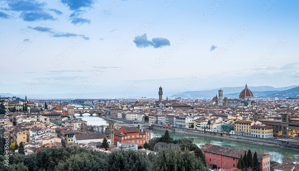 Obraz premium River Arno and famous bridge Ponte Vecchio at sunset from Ponte alle Grazie in Florence, Tuscany, Italy
