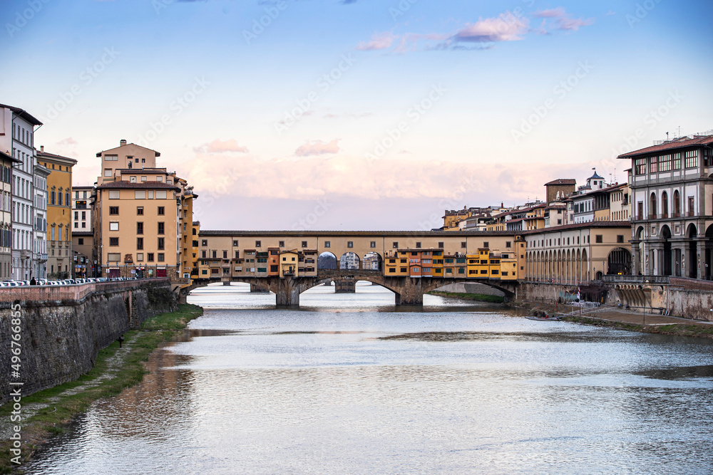 River Arno and famous bridge Ponte Vecchio at sunset from Ponte alle Grazie in Florence, Tuscany, Italy