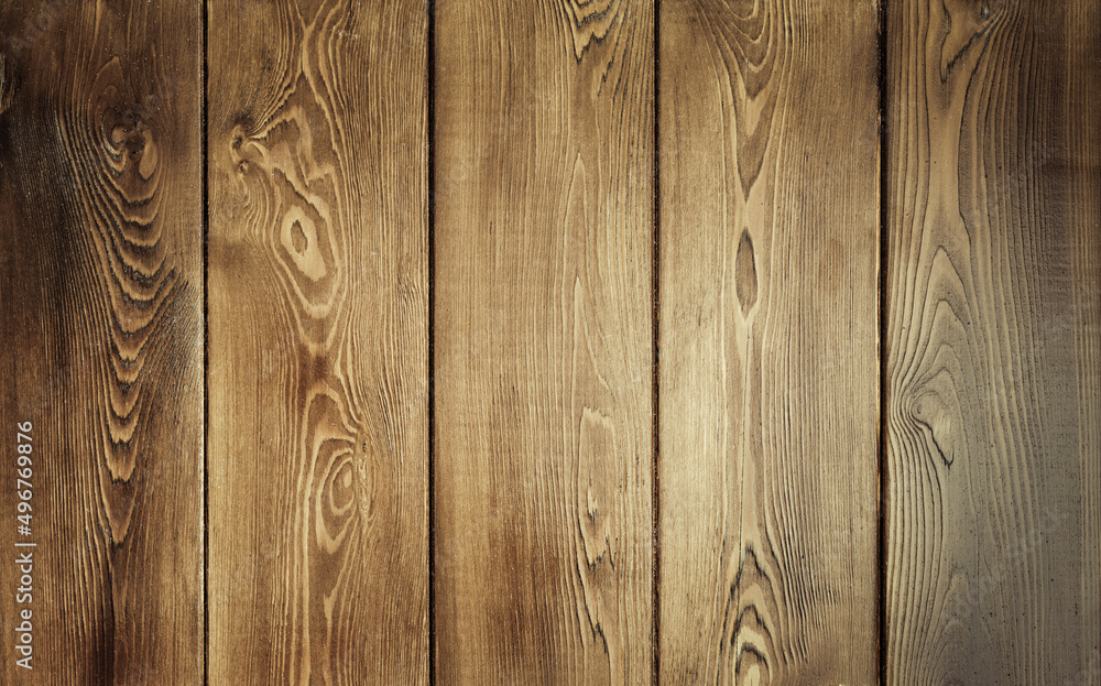 Fototapeta premium Old brown wooden background from dark natural wood in grunge style.