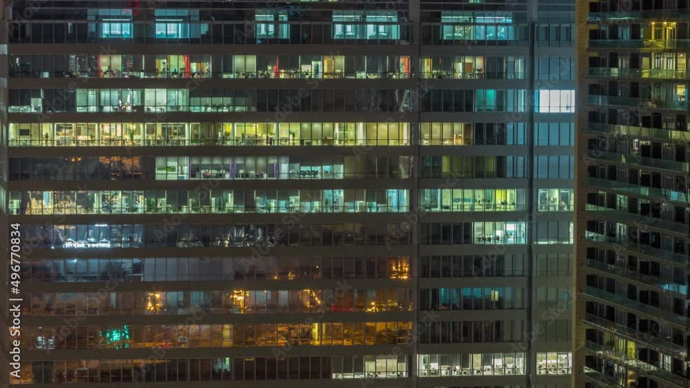 Windows of office buildings at night timelapse, the light from the windows of houses Windows of office buildings at night timelapse, the light from the windows of houses