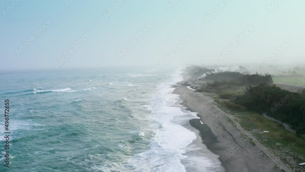 The tempest infringes on the sandy coast near the ocean The tempest infringes on the sandy coast near the ocean