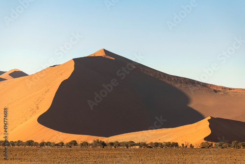 Beautiful photo of a duna with shadows on the both sides, Namibia.