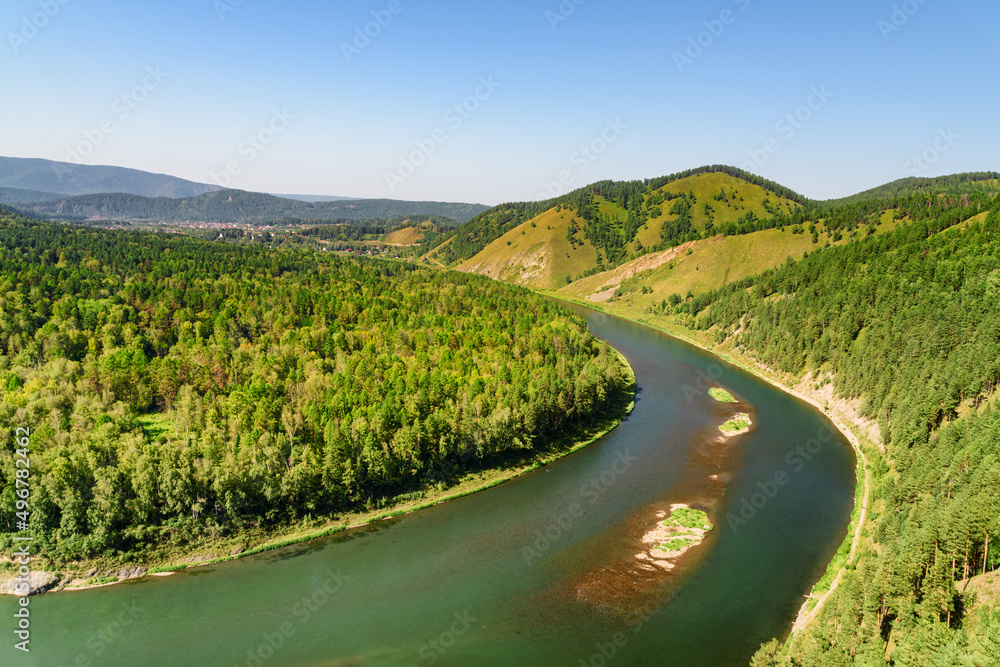 Awesome view of scenic river among evergreen woods Awesome view of scenic river among evergreen woods