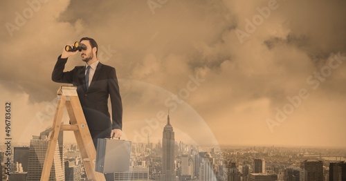 Composition of caucasian businessman on ladder looking through binoculars over cityscape