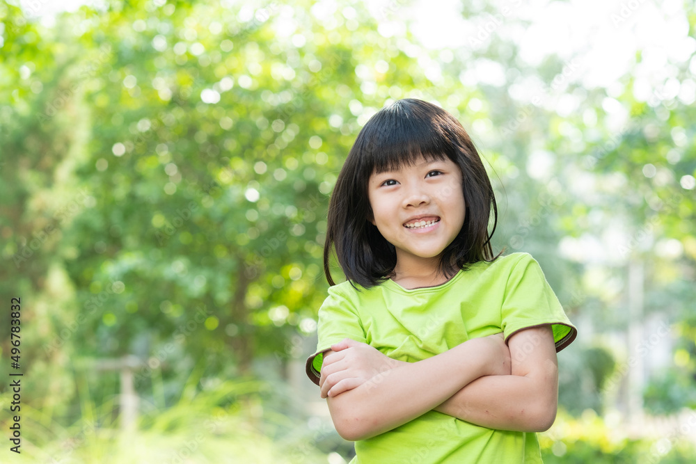 portrait asian kid, child enjoy and happy, the girl is smiling portrait asian kid, child enjoy and happy, the girl is smiling