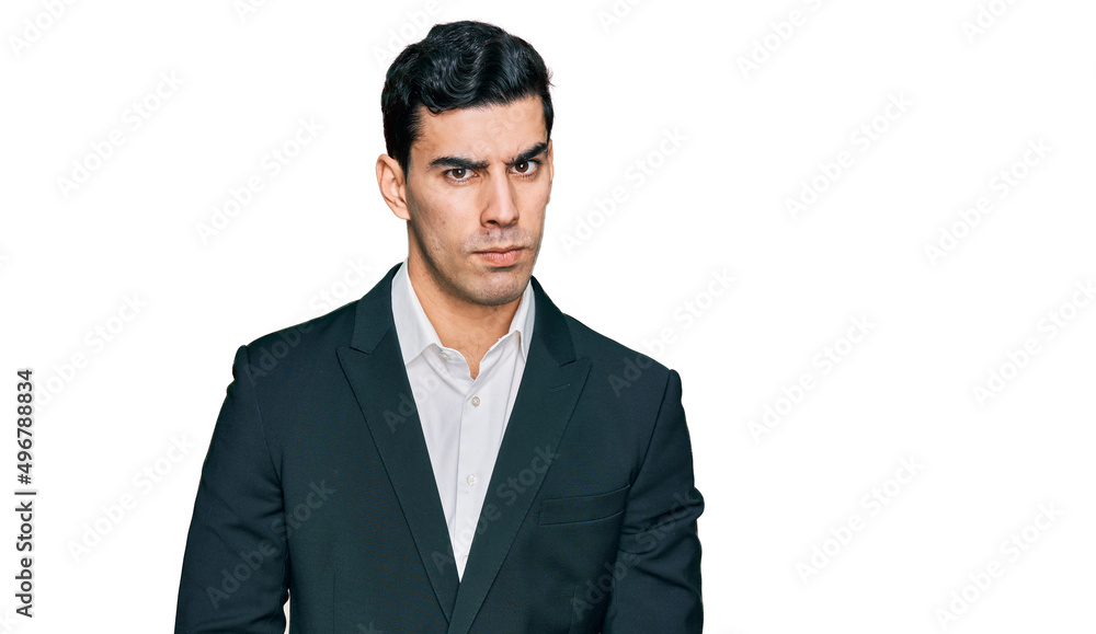 Handsome hispanic man wearing business clothes skeptic and nervous, frowning upset because of problem. negative person.