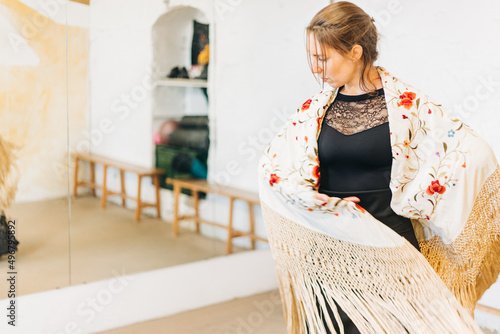 flamenco woman dancer in dance studio with copy space