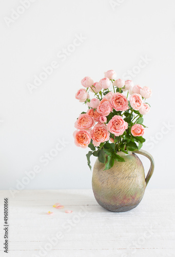 Wallpaper Mural bouquet of peony roses in ceramic jug on white background Torontodigital.ca