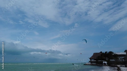 Nice sunny day off at city kite surf beach. Holbox, Mexico - december 2021. High quality 4k footage