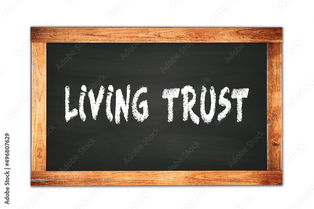 LIVING TRUST text written on wooden frame school blackboard. LIVING TRUST text written on wooden frame school blackboard.