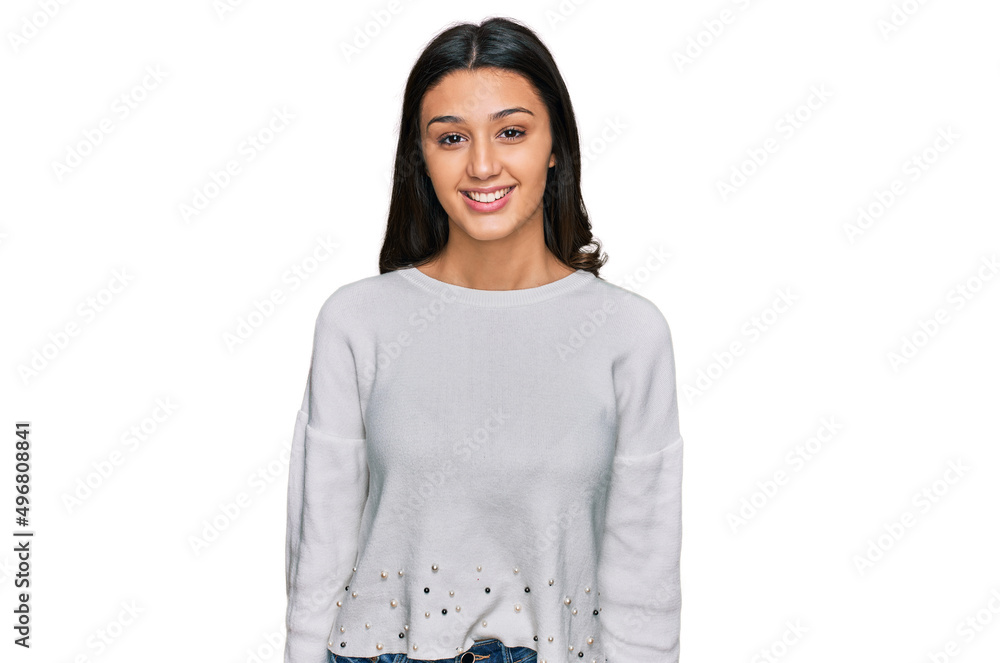 Young hispanic girl wearing casual clothes with a happy and cool smile on face. lucky person. Young hispanic girl wearing casual clothes with a happy and cool smile on face. lucky person.