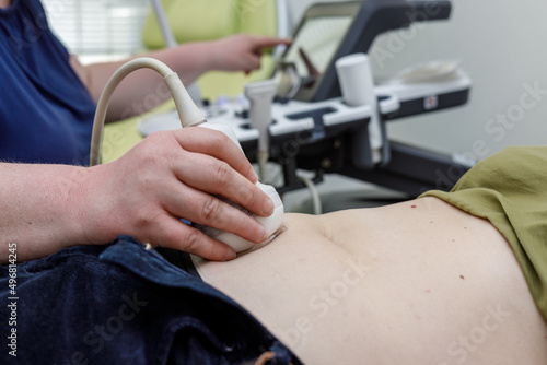 Doctor gynecology operating ultrasound scanner