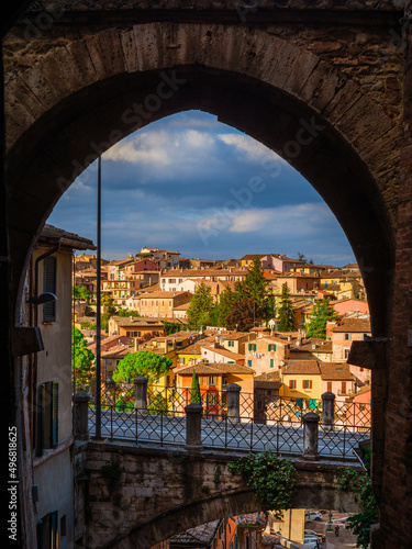 Perugia old skyline seen from 'Via Appia' medieval arch