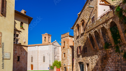 'Via San Francesco' (St Francis Street) in Perugia historical center with medieval church © crisfotolux
