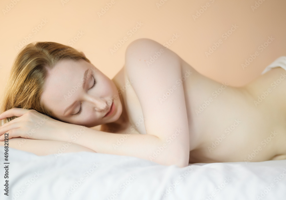 Close up portrait of a beautiful young lady lying on the bed. Close up portrait of a beautiful young lady lying on the bed.