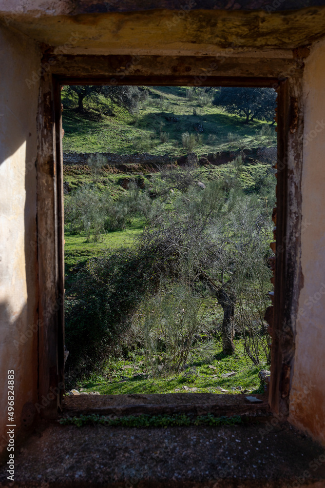 Old abandoned mill in extremadura meadow