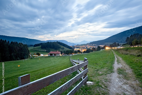 Maso Spilzi in the meadows of Folgaria and the village of Costa. Cimbra Alp, Trento province, Trentino Alto-Adige, Italy, Europe.