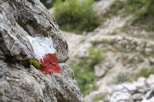 Closeup shot of the painted sign on the stone photo