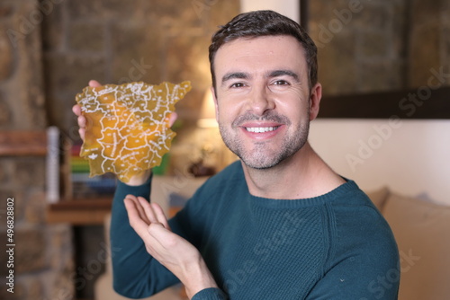 Фотография Man holding Spanish country geographic shape