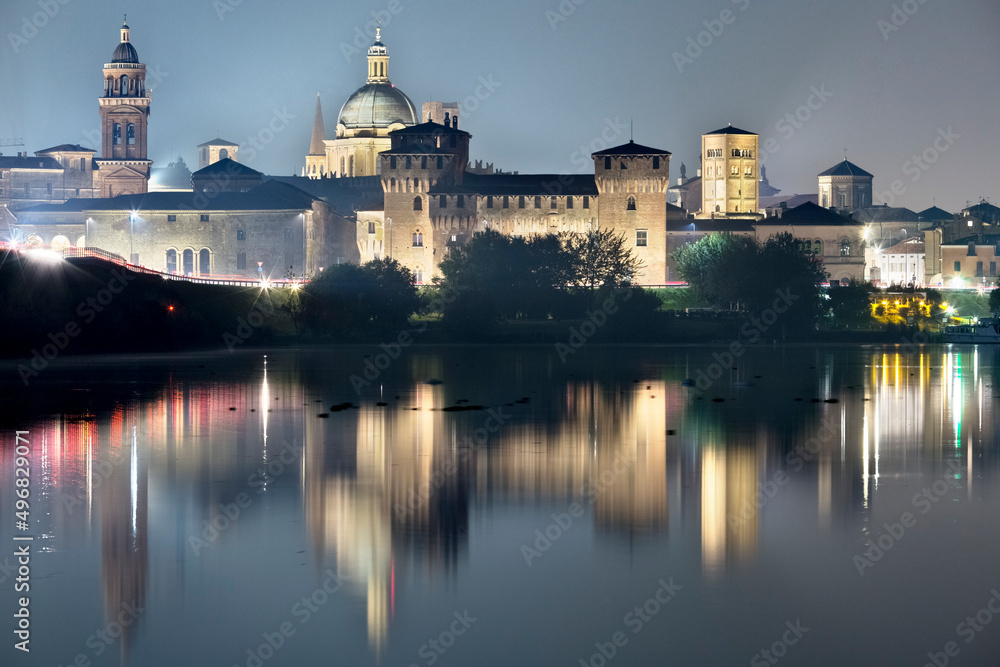 Mantova: the San Giorgio castle is reflected on the middle lake of the Mincio river. The city has been included in the list of UNESCO World Heritage Sites. Lombardy, Italy, Europe.