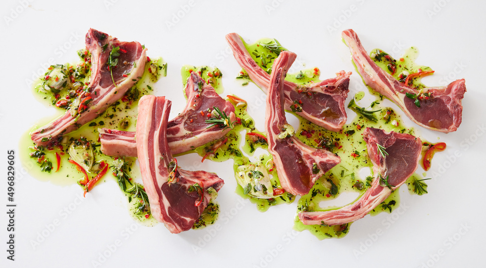 Photography Uncooked lamb chops in marinate