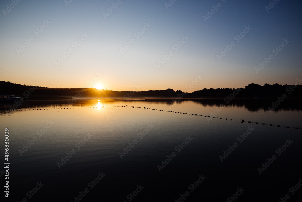 Sunset on the lake in Przybrodzin, Poland
