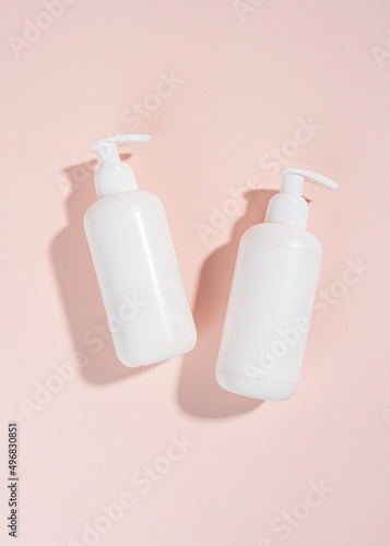 Blank white Bottles for Cosmetics  Mock up Cream Jar on a Pink light background  Packaging for Cosmetics without logo and label