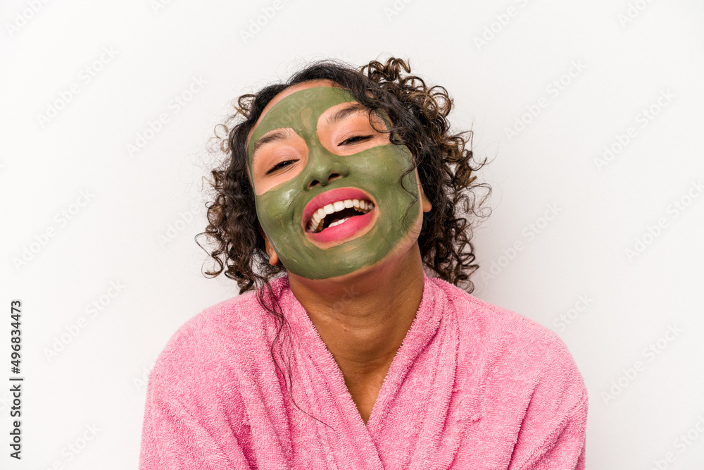 Young hispanic woman wearing a facial mask isolated on white background Young hispanic woman wearing a facial mask isolated on white background
