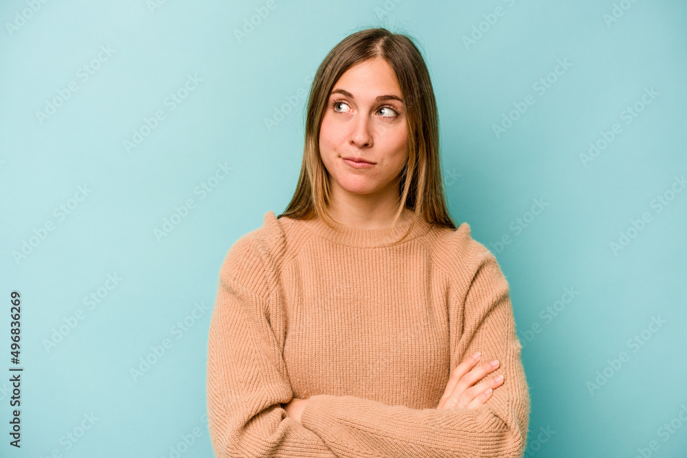 © Asier - Young caucasian woman isolated on blue background unhappy looking in camera with sarcastic expression. © Asier - Young caucasian woman isolated on blue background unhappy looking in camera with sarcastic expression.
