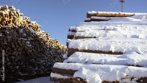 A huge warehouse of wood under the open sky