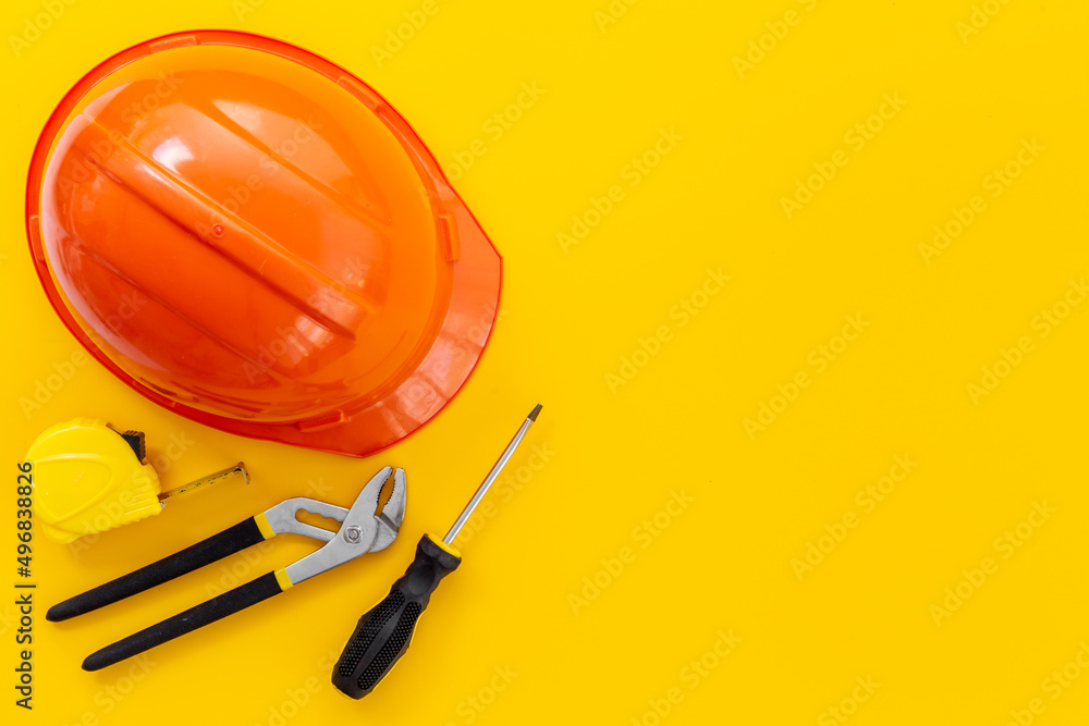 Engineer safety helmet with construction tools, top view Engineer safety helmet with construction tools, top view