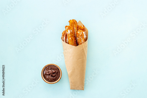 Fast food sweets - churros in paper bag