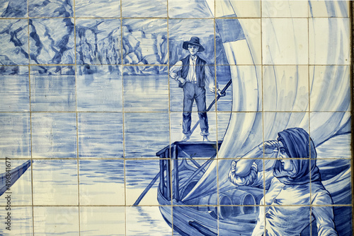 panels of azulejos represent the wine shipment down the Douro in the Sao Bento railway station, Porto, Portugal