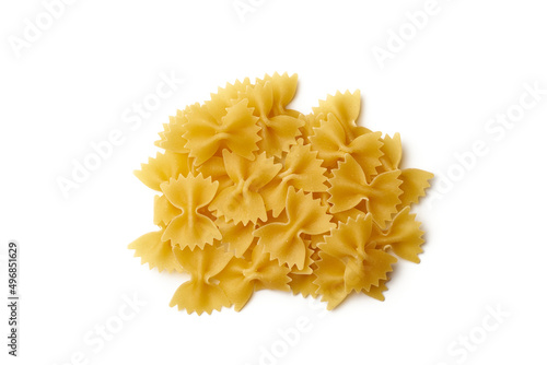 Top view of heap of raw farfalle pasta isolated on white background