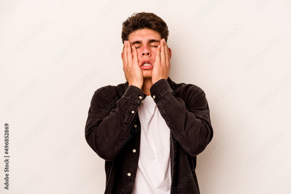 Young caucasian man isolated on white background whining and crying disconsolately. Young caucasian man isolated on white background whining and crying disconsolately.
