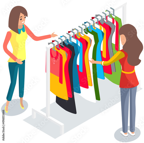 Girl choosing clothes for trousers and shirts fluttered on hangers, elements of wardrobe in store. Woman standing in front of hangers and choosing outfit. Fashion, clothes store, shopping concept.