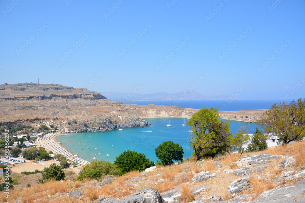 Fototapeta premium lindos bay with blue mediterranean sea, view from top of mountain