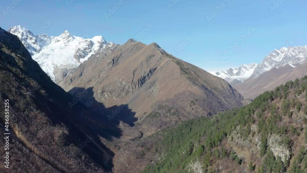 Digoriya gorge Day Drone flying down opposite glacier, Tuymazinsky glacier, Digoriya gorge, Northern Ossetia - Alania, Caucasus, Russia Digoriya gorge Day Drone flying down opposite glacier, Tuymazinsky glacier, Digoriya gorge, Northern Ossetia - Alania, Caucasus, Russia