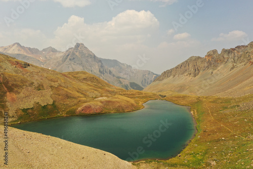 Upper lakes surrounded by rocky mountains in Colorado photo