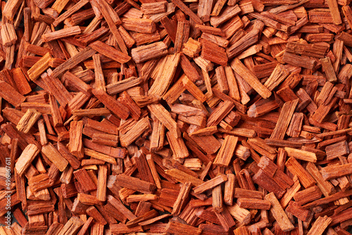 фотографія Background made of red sandalwood chips with copy space