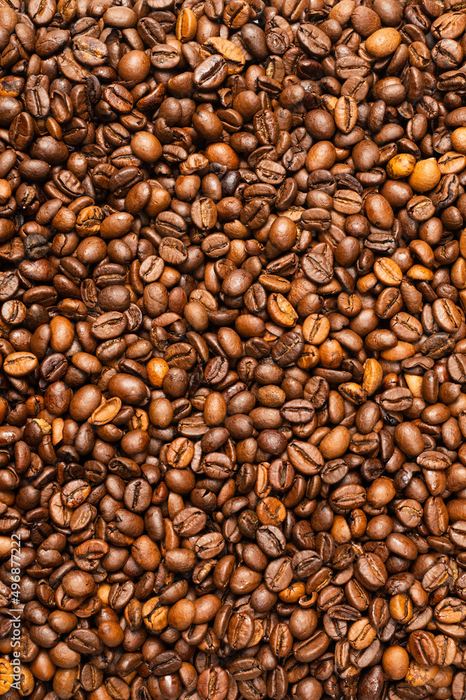 Coffee beans on a white background. Top view. Coffee beans on a white background. Top view.