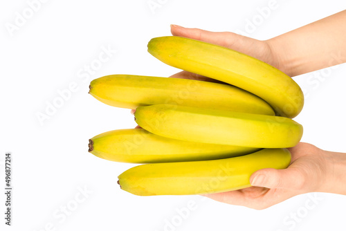 A bunch of bananas in woman hand isolated on white background.