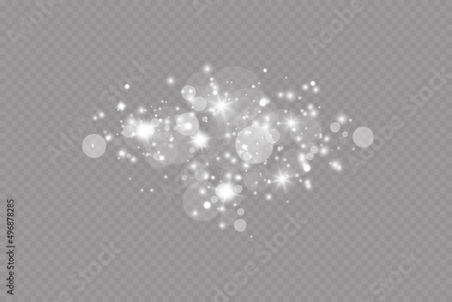 Light effect. Background of sparkling particles. Glittering elements on a transparent background.