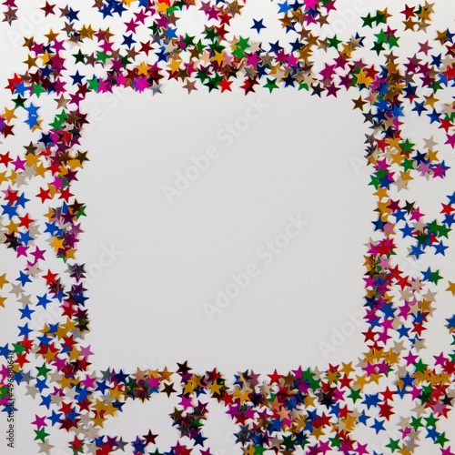 border frame made of glitter on a white background with copyspace