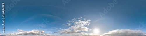 blue sky hdri 360 panorama with white beautiful clouds in seamless projection with zenith for use in 3d graphics or game development as sky dome or edit drone shot for sky replacement © hiv360
