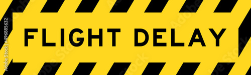 Yellow and black color with line striped label banner with word flight delay