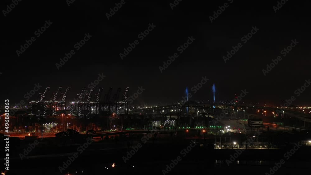 Record number of cargo ships stuck in Long Beach's bottlenecked port - nighttime wide angle view of ships in the harbor Record number of cargo ships stuck in Long Beach's bottlenecked port - nighttime wide angle view of ships in the harbor