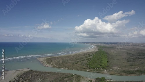 Drone video of the mouth of the Shkumbin River, Albania, in the Divjake-Karavasta Nature Park. frontal plane descending. photo